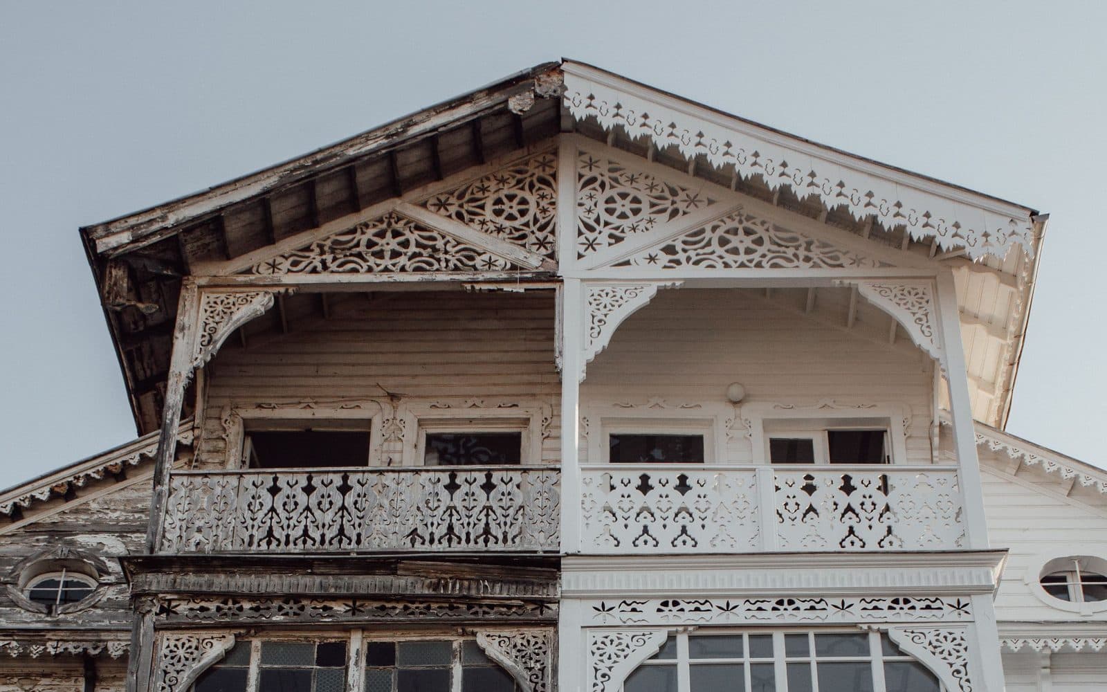 Two similar houses side by side representing a comparison of buyer types